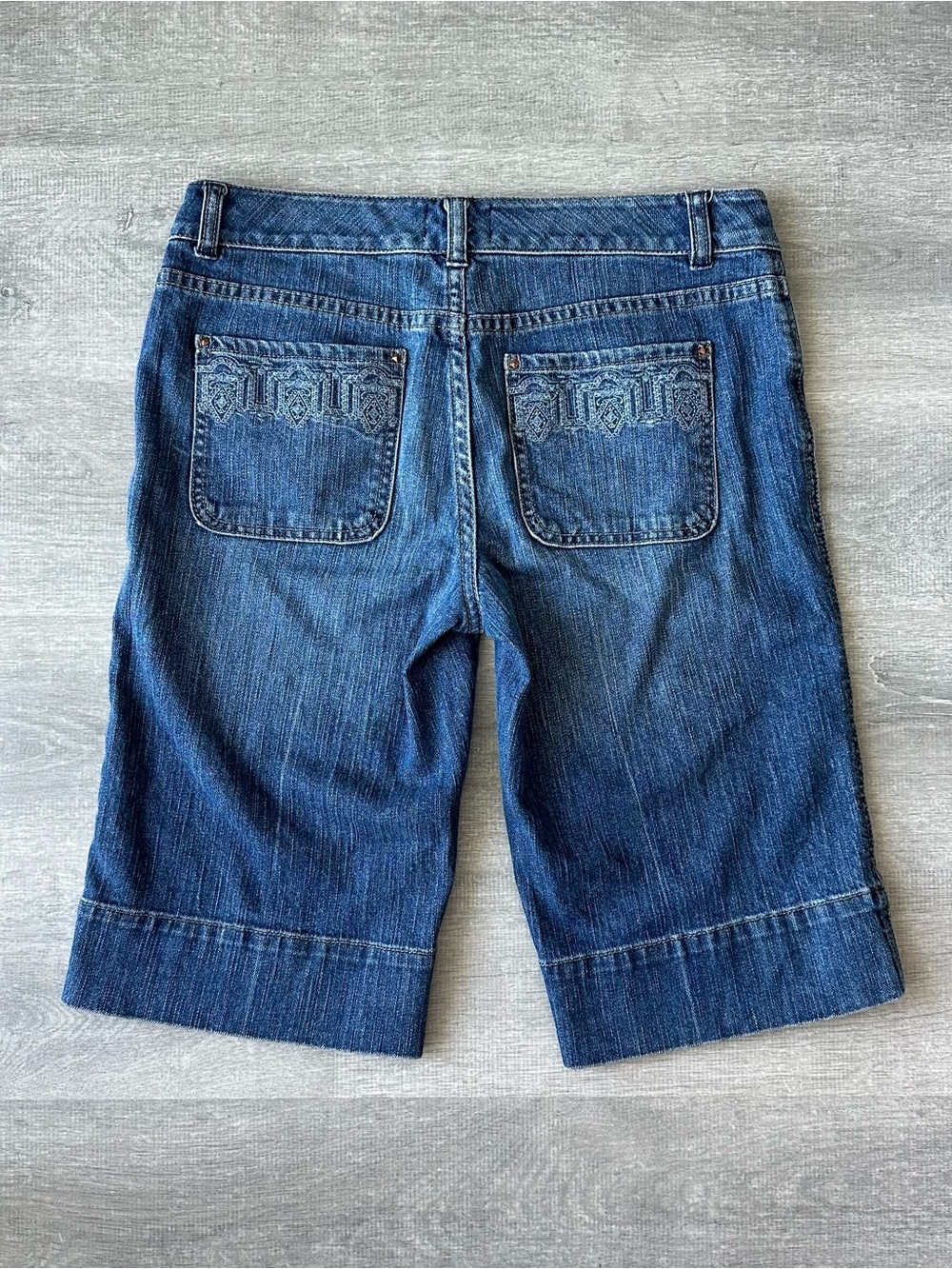 WHBM navy blue denim low rise bermuda shorts/ angle pants with embroidery back